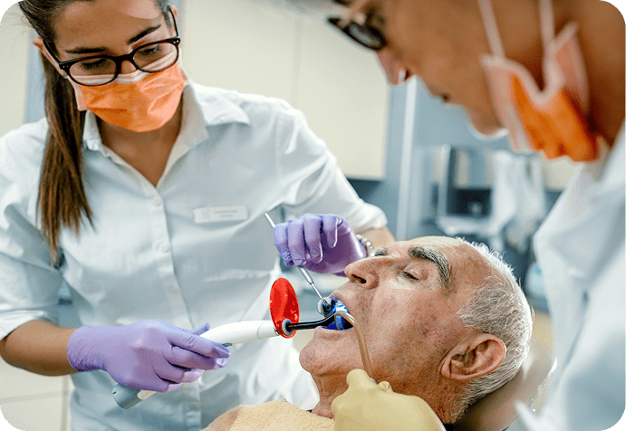 Dental procedure with patient and staff