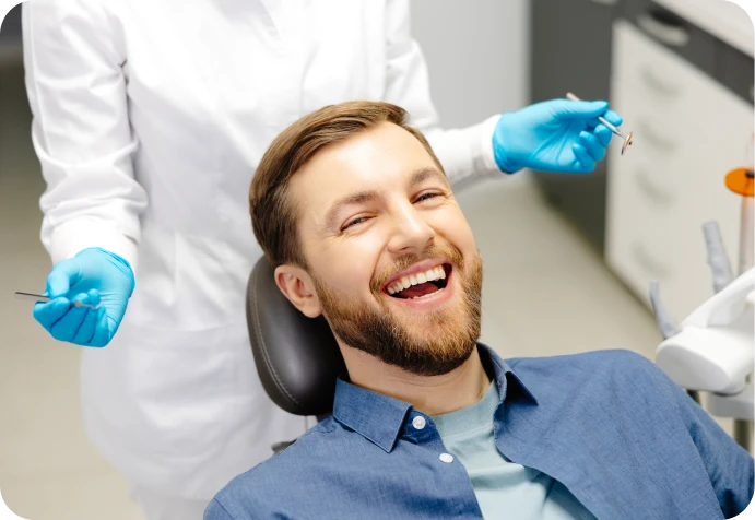 Man smiling at dentist's office